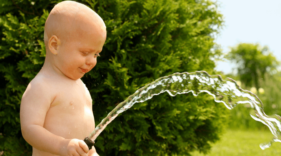 Baby Holding Hose