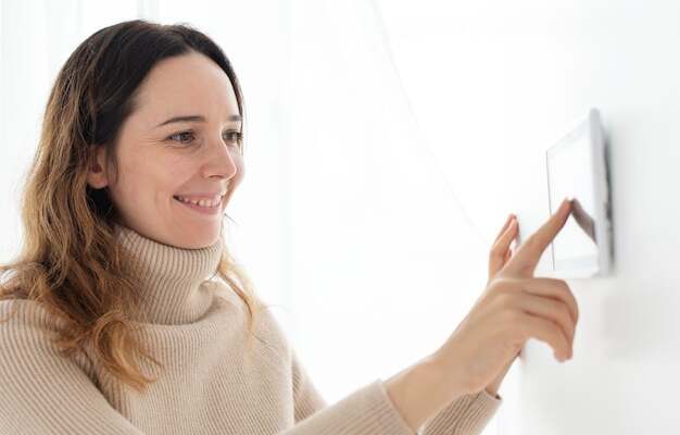 Free photo woman pressing on smart home automation panel monitor
